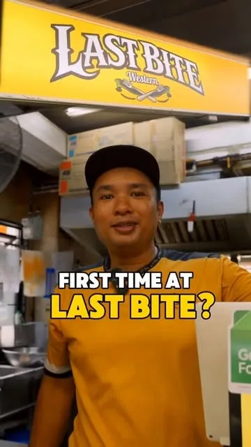 The Last Bite Western stall and its owner at Dover Crescent, under the yellow signboard
